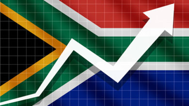 Arrow growth up on the background of the South Africa flag