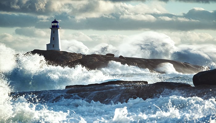 Peggy's Cove Lighthouse is inundated with surf associated with a violent Nor'Easter.