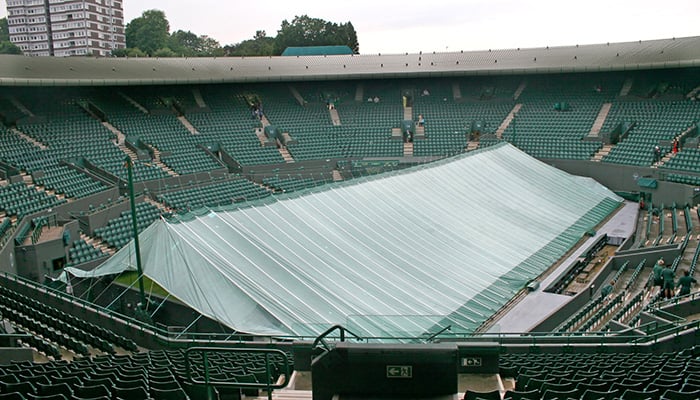 A tennis court covered because of bad weather