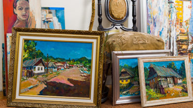 Collection of different types of handmade framed paintings in the workshop.
