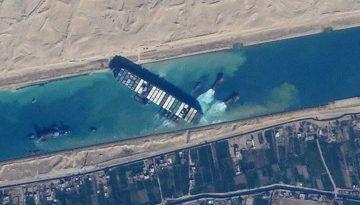 The containership Ever Given stuck in the Suez Canal in Egypt, viewed from the International Space Station. Credit: NASA JSC ISS image library