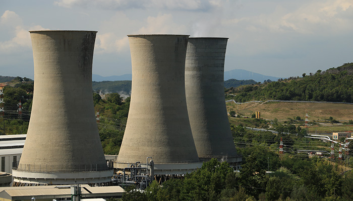 Larderello, Tuscany, Italy. About september 2019. Geothermal power plant for electricity production. Condensation towers in reinforced concrete.