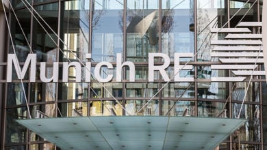 Munich, Bavaria / Germany - Mar 18, 2020: Close up of Munich Re logo / sign above the entrance of the LeopoldstraÃŸe offices. Munich Re is one of the largest Reinsurance companies in the world.