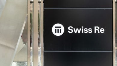 Toronto, Canada - August 25, 2021: The Swiss Re (Swiss Reinsurance Company Canada) sign at their head office in Toronto. The Swiss Re Group is a provider of reinsurance and insurance.
