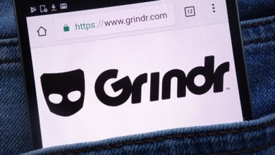KONSKIE, POLAND - JUNE 11, 2018: Grindr website displayed on smartphone hidden in jeans pocket