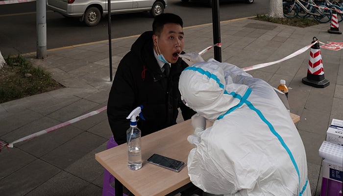 03 March 2022 Chengdu, China: The first Omicron Varian found in Chengdu, The city is on high alert, A man testing his infection.