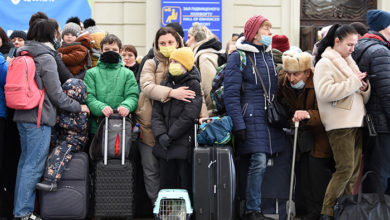 Lviv, Ukraine - February 26, 2022. People in railway station of western Ukrainian city of Lviv waiting for the train to Poland.