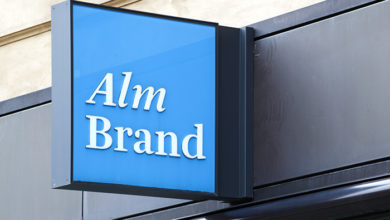 Copenhagen, Denmark - August 28, 2018: Alm Brand logo on a wall. Alm Brand a Danish financial services group operating within the markets for non-life, life and pension insurance as well as banking