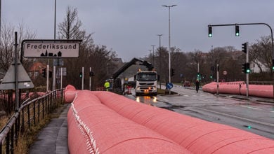 Big pink water tube to prevent the storm Malik in frederikssund to flood the city Fredrikssund, Denmark, January 29, 2022