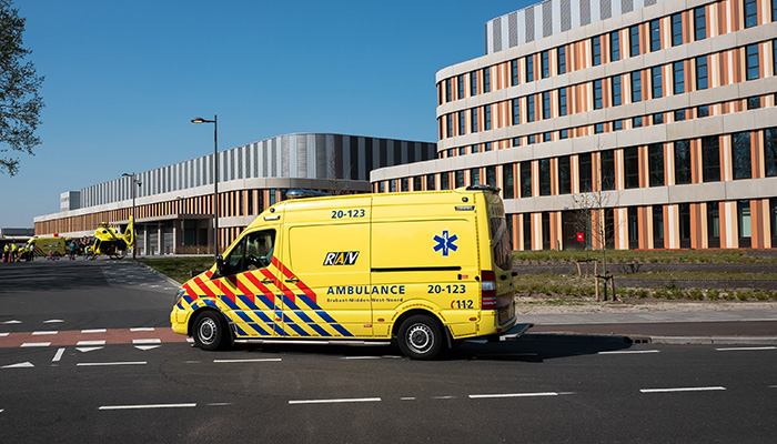BREDA - APRIL 9: an ambulance arrives at the Amphia hospital on 9 April 2020 in Breda, The Netherlands. During the coronavirus pandemic healthcare workers are working overtime to help patients.
