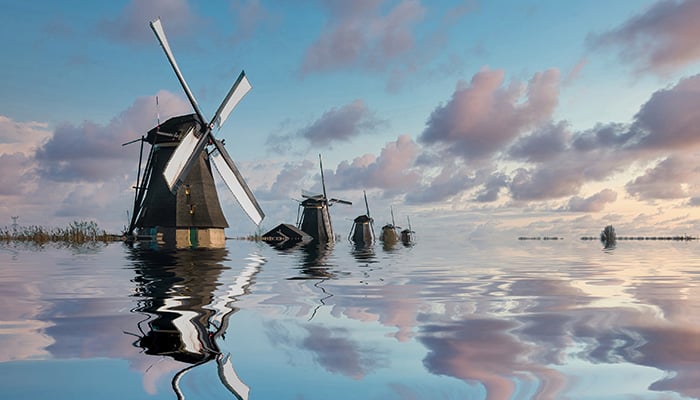 Beautiful view of flooded windmill area in Holland