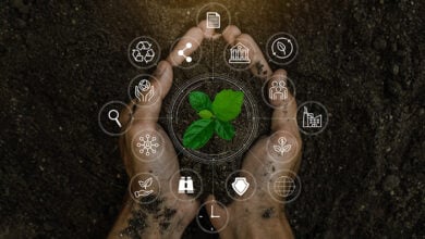 ESG icon concept in the woman hand for environmental, social, and governance by using technology of renewable resources to reduce pollution and carbon emission .
