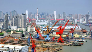 Shanghai port, China - the Huangpu river and the city skyline.