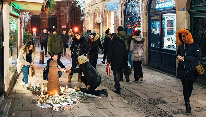 Mourners at a vigil for terrorism victims, Strasbourg, France