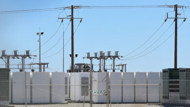 Battery storage at solar farm with Switchgear or switch gear in background