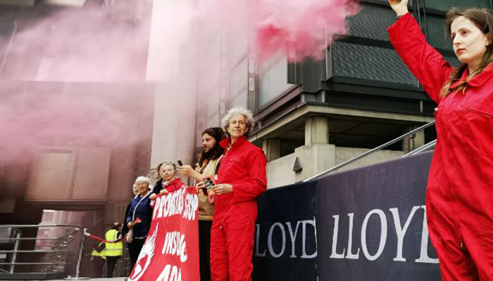 Lloyd’s AGM disrupted on 25 May 2023 by climate protestors who staged a fake fire outside the Lloyd’s building in London