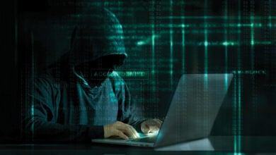 Cyber Attack Hacker using computer with code on interface digital dark background. Security System and Internet crime concept.