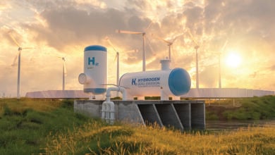 Hydrogen Gas tank renewable energy production - hydrogen gas pipeline for clean electricity solar and windturbine facility. Probably a rendered (fake) image