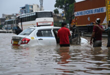 ehicles submerged in water on Delhi-Jaipur Expressway after rain in Millennium City Gurgaon. Flood like situation. Gurgaon, Haryana, India. September 24, 2022