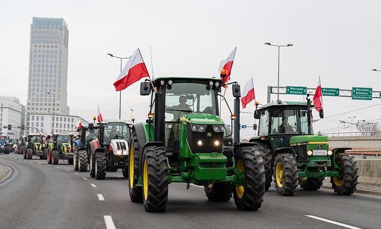 KRAKOW, POLAND - FEBRUARY 9, 2024: National farmer's strike. Ogólnopolski protest rolników. Farmers demonstration, protesting on Polish roads, blocking city streets traffic with slow-moving tractors.